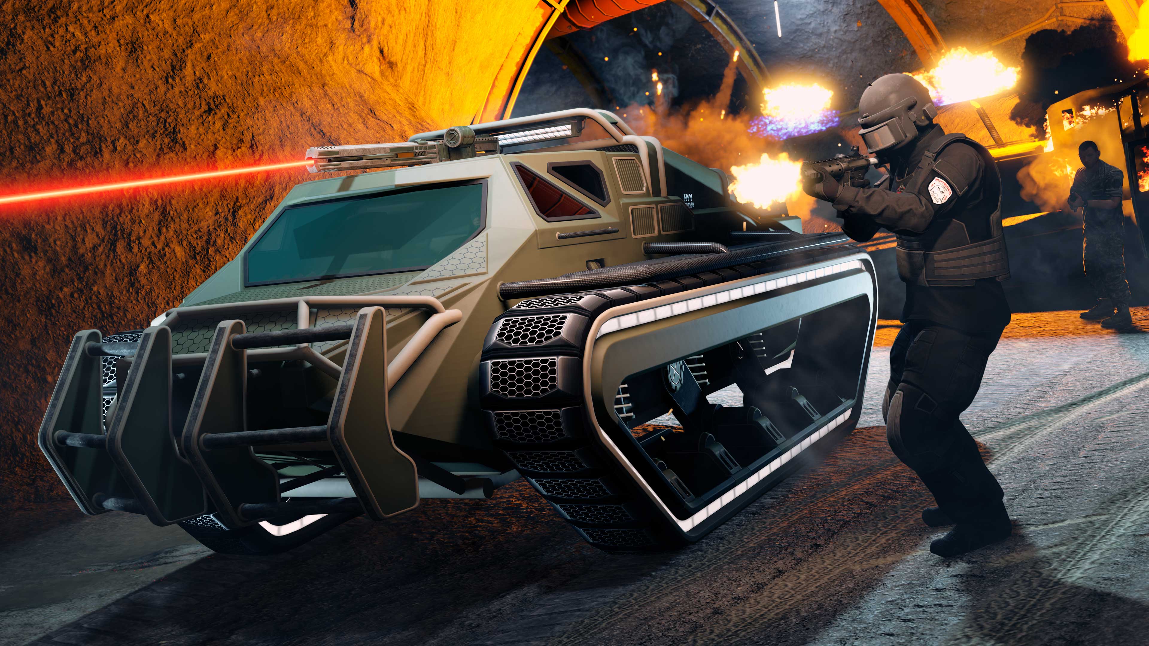 An armored character stands near a weaponized Scarab with a laser sighted turret and continuous track wheels.