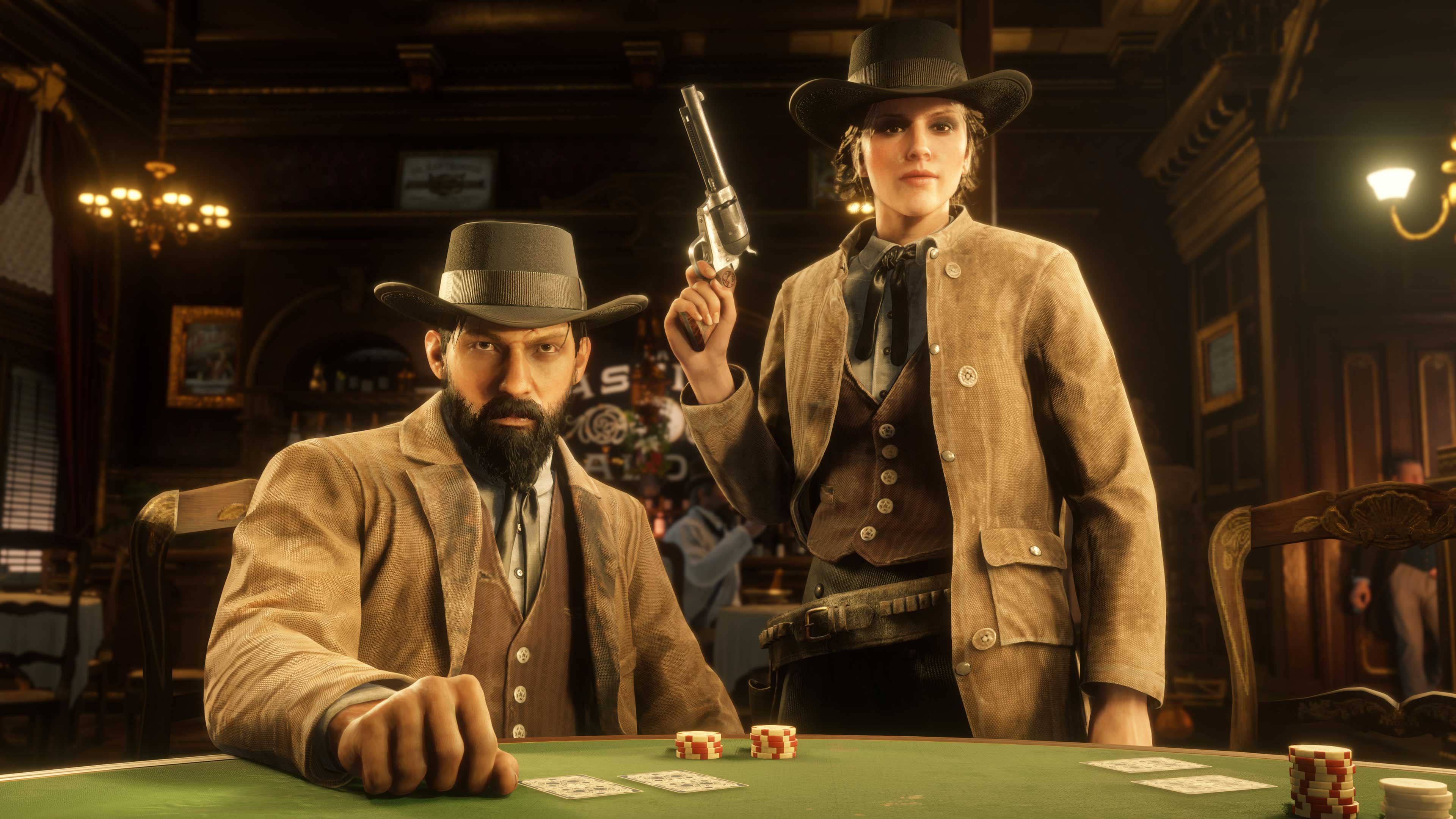 Dois personagens de Red Dead Online vestidos com o traje inspirado na comunidade em uma mesa de jogo no saloon.